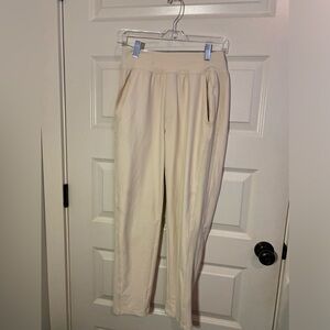 Powersoft size S cream colored athletic pants.